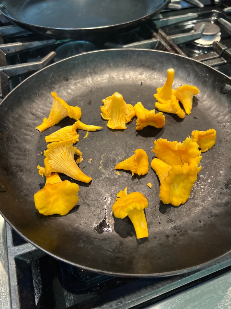 Chanterelles in the pan.